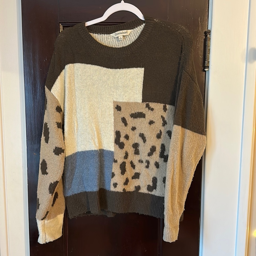 Woman’s sweater.